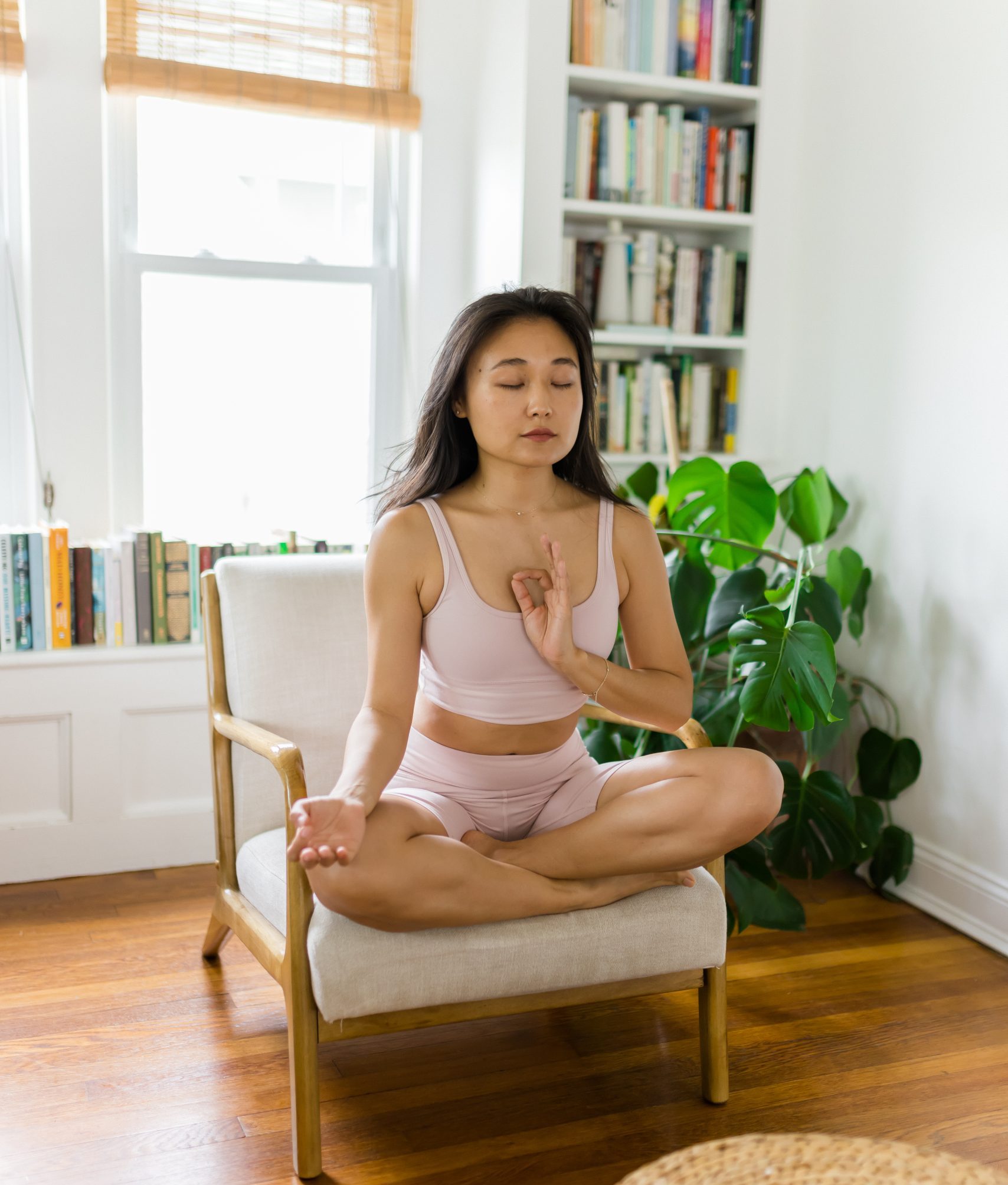 A serene yogi meditating in a peaceful natural setting, symbolizing the principle of Santosha and the cultivation of inner contentment and peace.