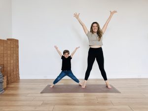 Kate Lombardo and son Aris in star pose