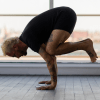 Patrick Franco in a popular arm balance known as crow pose or Bakasana